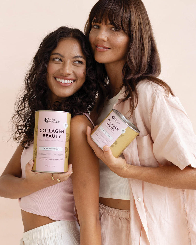 Two women holding cans of Collagen Beauty